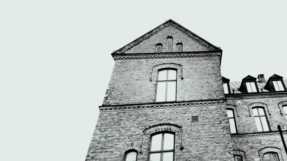 siluett av en av institutionens byggnader.illustration